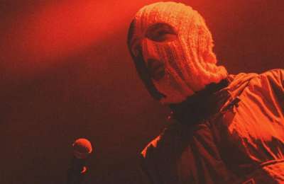 Calls to Ban Controversial Band Kneecap from Glastonbury Line-Up 