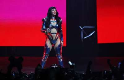 KATY PERRY SHOCKED AS FAN STORMS STAGE MID-SONG