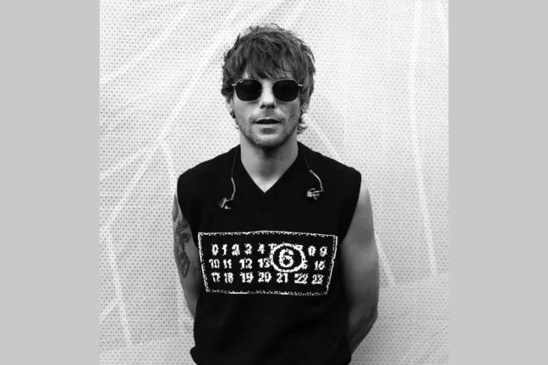 LOUIS TOMLINSON QUITS X OVER “CONSPIRACY CHAT” ABOUT HIS PERSONAL LIFE