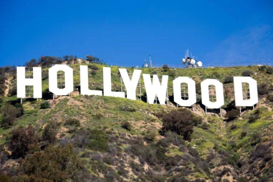 JOHN LEGEND AND CHRISSY TEIGEN DITCH SUNNY L.A. FOR LONDON’S CHILLY CHARM