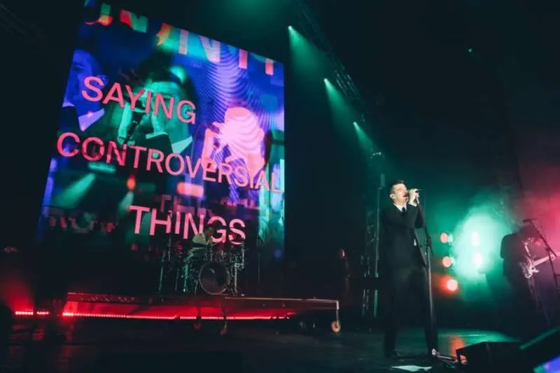 THE 1975 SPEND FOUR TIMES THEIR FEE ON GLASTONBURY SET